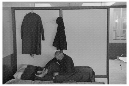 Man Examines Ankle at Homeless Bureau Sioux City 1936