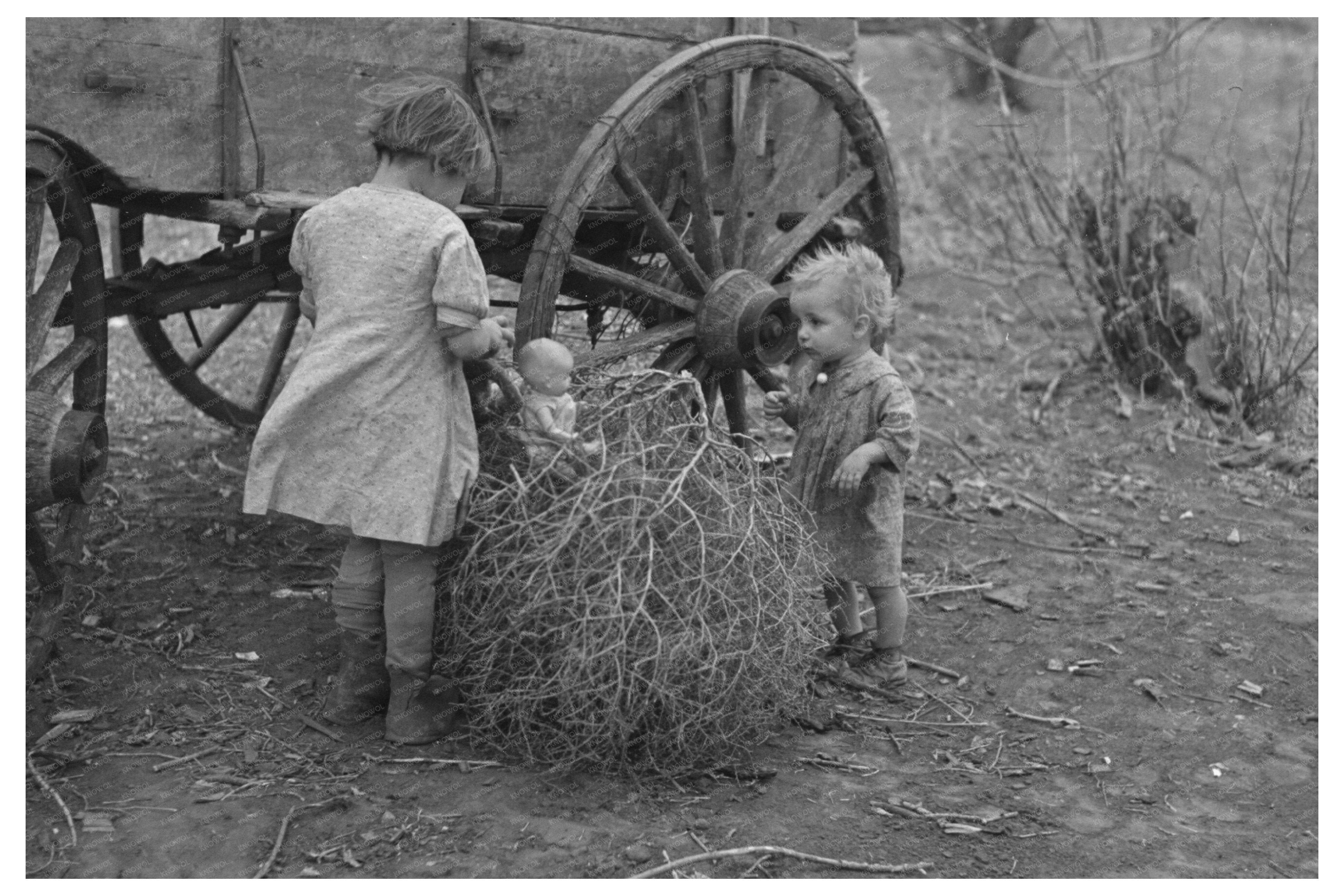 Children Playing with Dolls in Tumbleweeds Iowa 1936