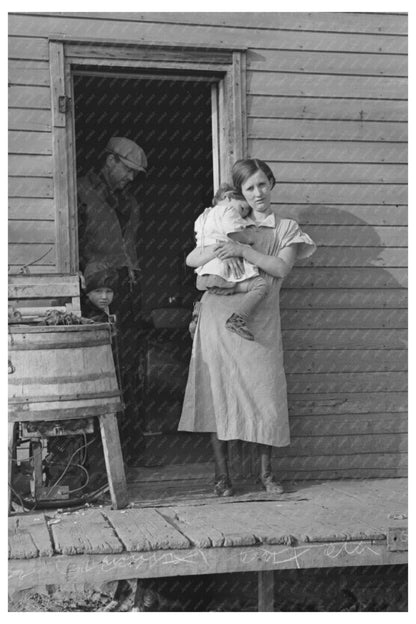 Mrs. Glen Cook with Baby in Little Sioux Township 1936