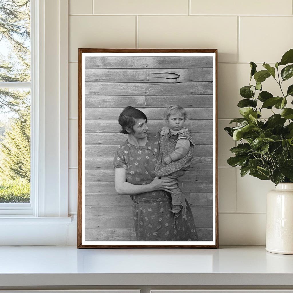 Mrs. Ed Boltinger and Child on Iowa Farm January 1937