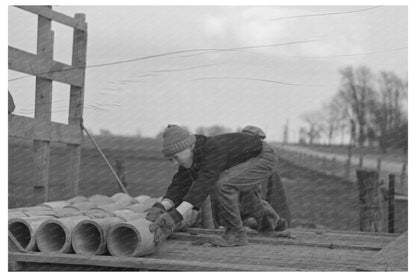 Tip Estes Son Loading Tiles in Fowler Indiana March 1937