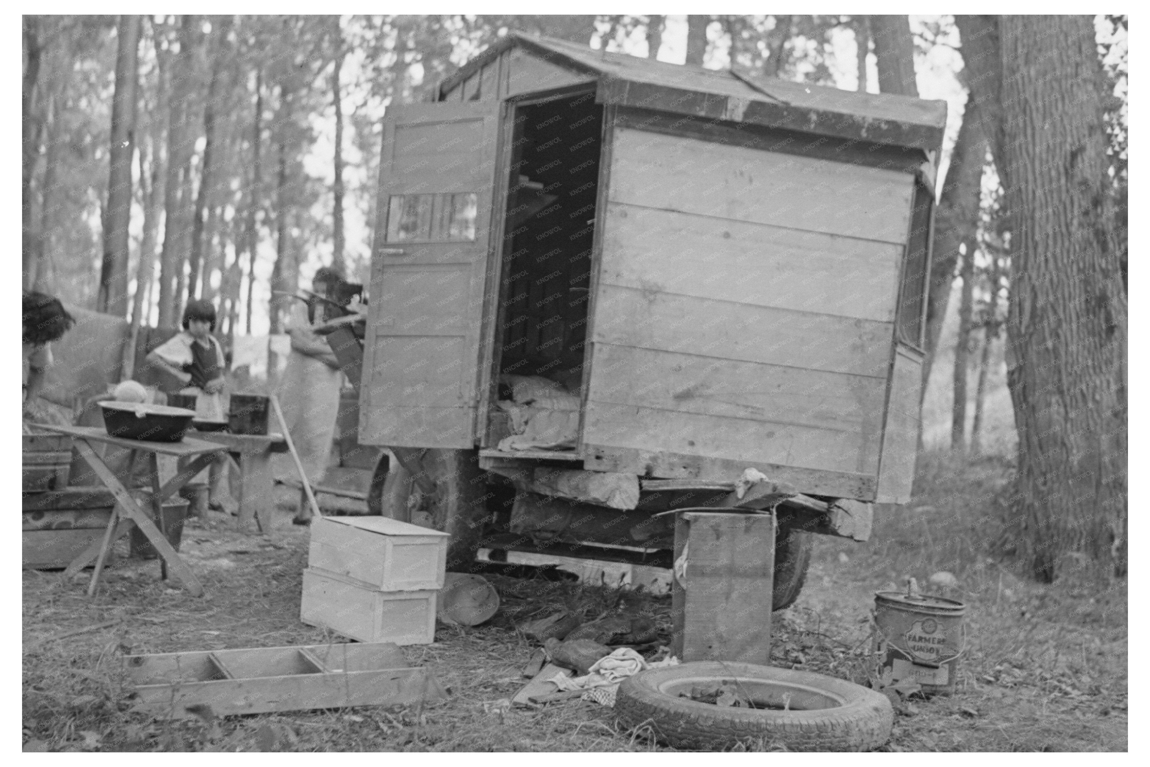 Indian Boy by Tent in Little Fork Minnesota 1937