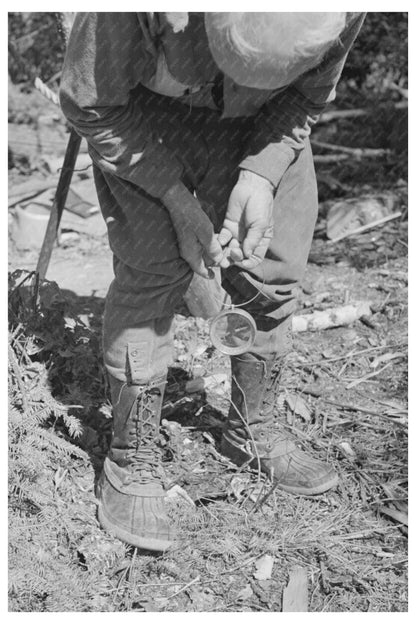 William Besson Using Dip Needle in Minnesota 1937