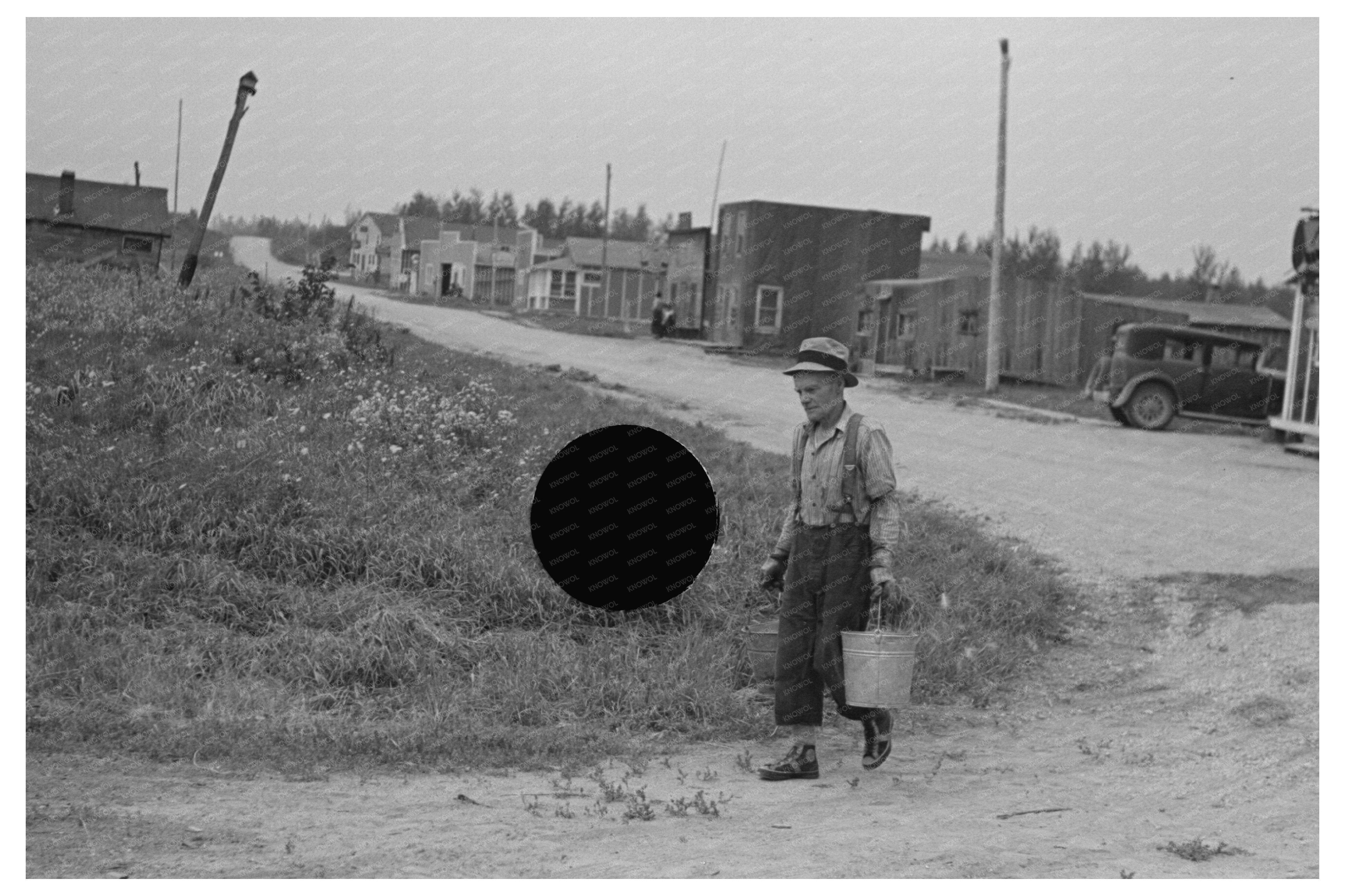 Herman Gerling Filling Barrels in Wheelock ND 1937