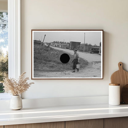 Herman Gerling Filling Barrels in Wheelock ND 1937