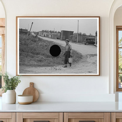 Herman Gerling Filling Barrels in Wheelock ND 1937