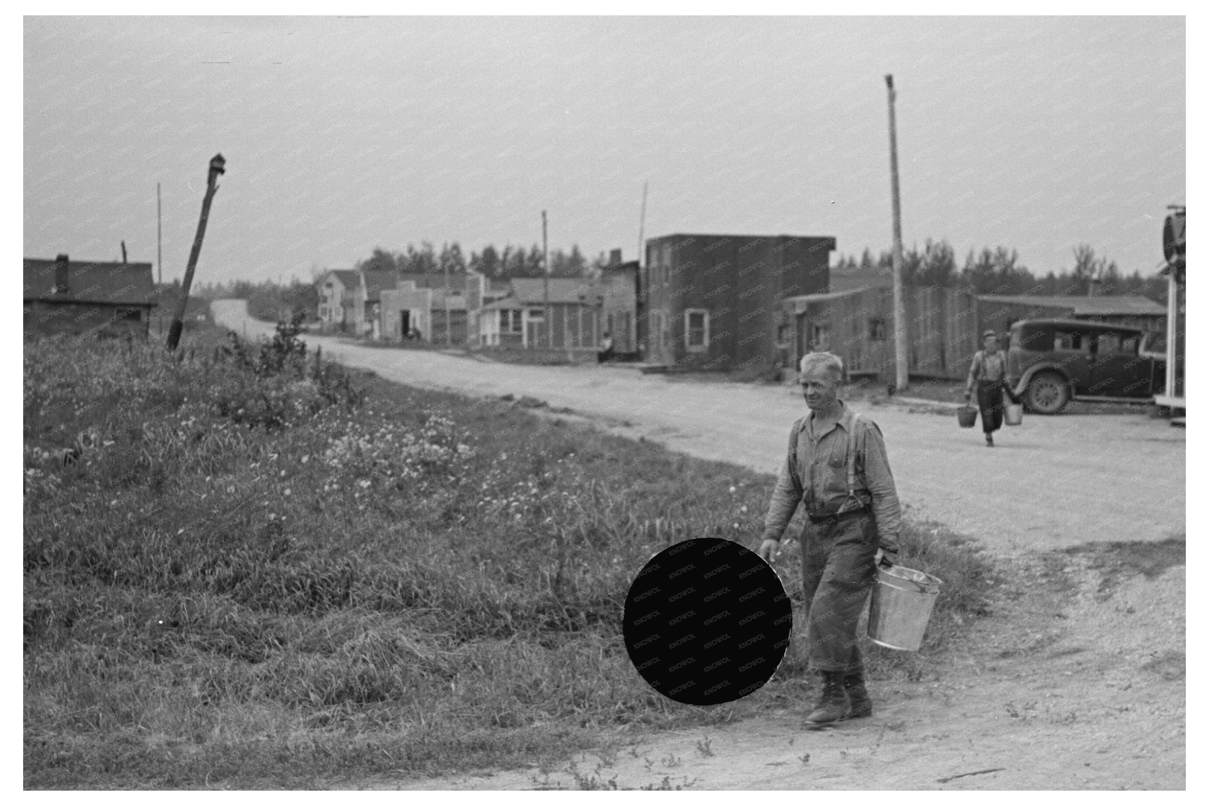 Herman Gerling Filling Barrels in Wheelock North Dakota 1937