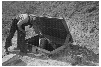 Herman Gerling Filling Barrels from Spring North Dakota 1937