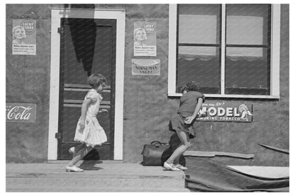 Children Playing in Front of Saloon Gemmel Minnesota 1937