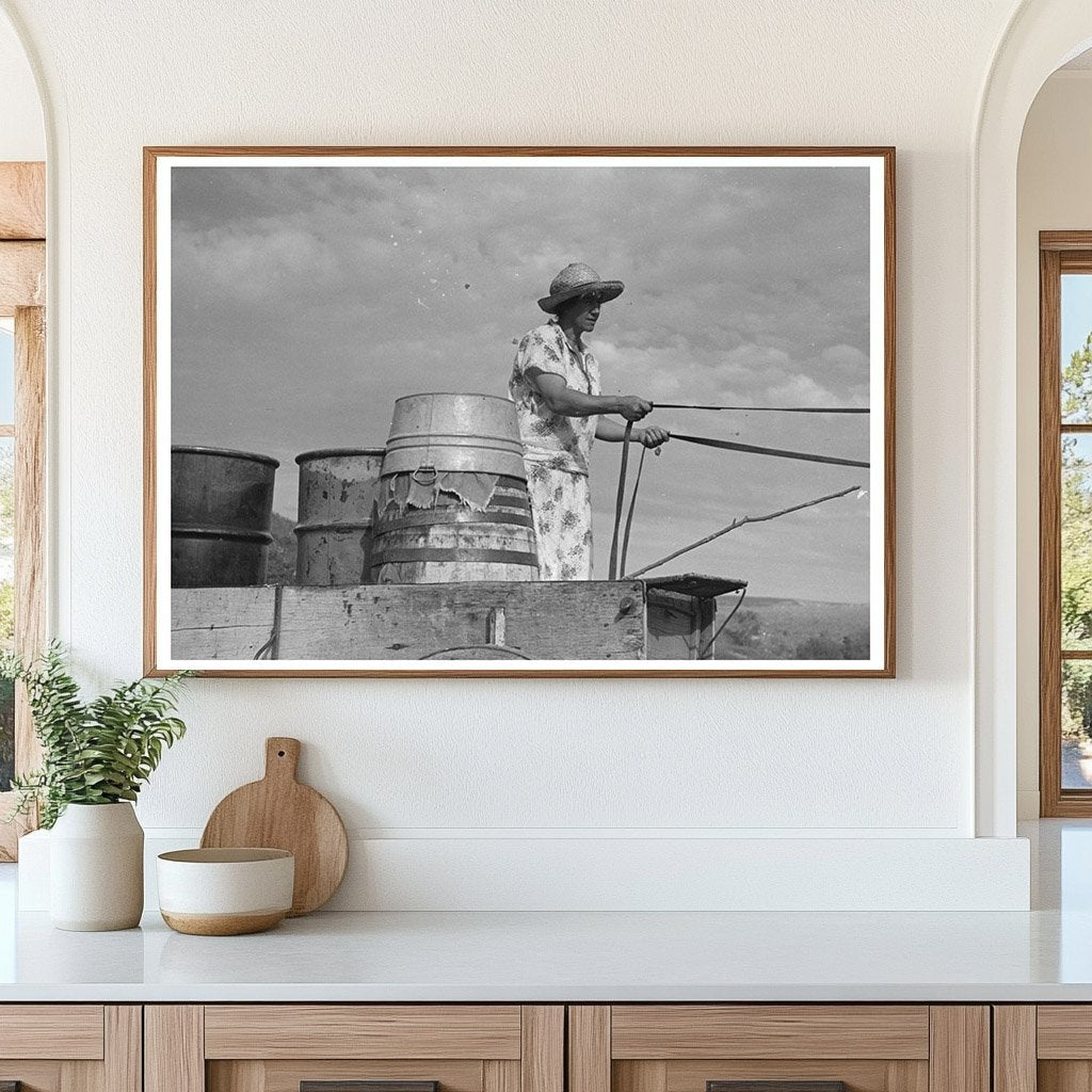 Mrs. Olie Thompson Driving Home with Water Barrels 1937