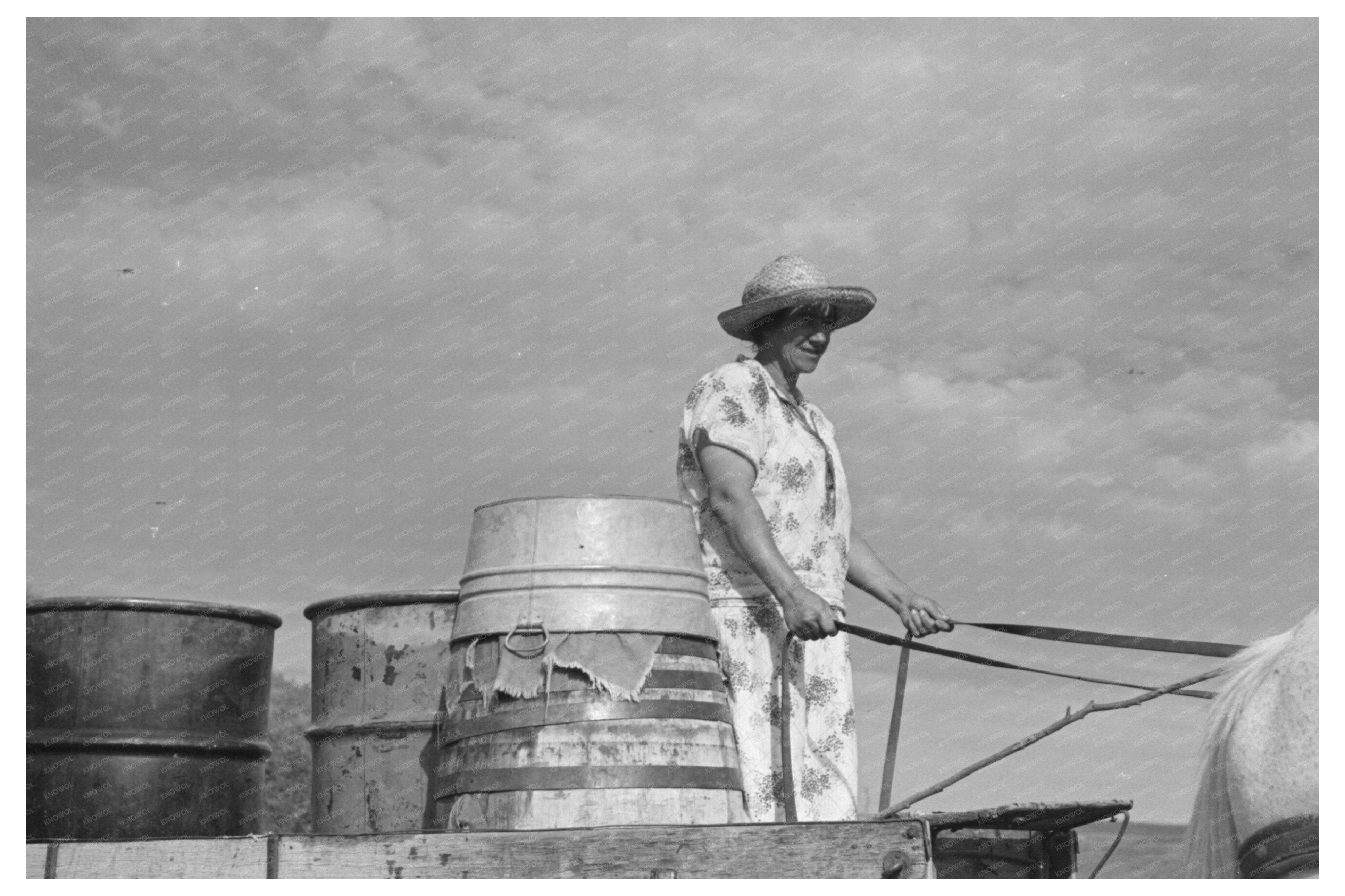 Mrs. Olie Thompson Collecting Water North Dakota 1937