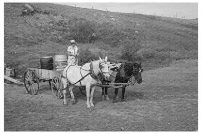 Mrs. Olie Thompson with Water Barrels North Dakota 1937