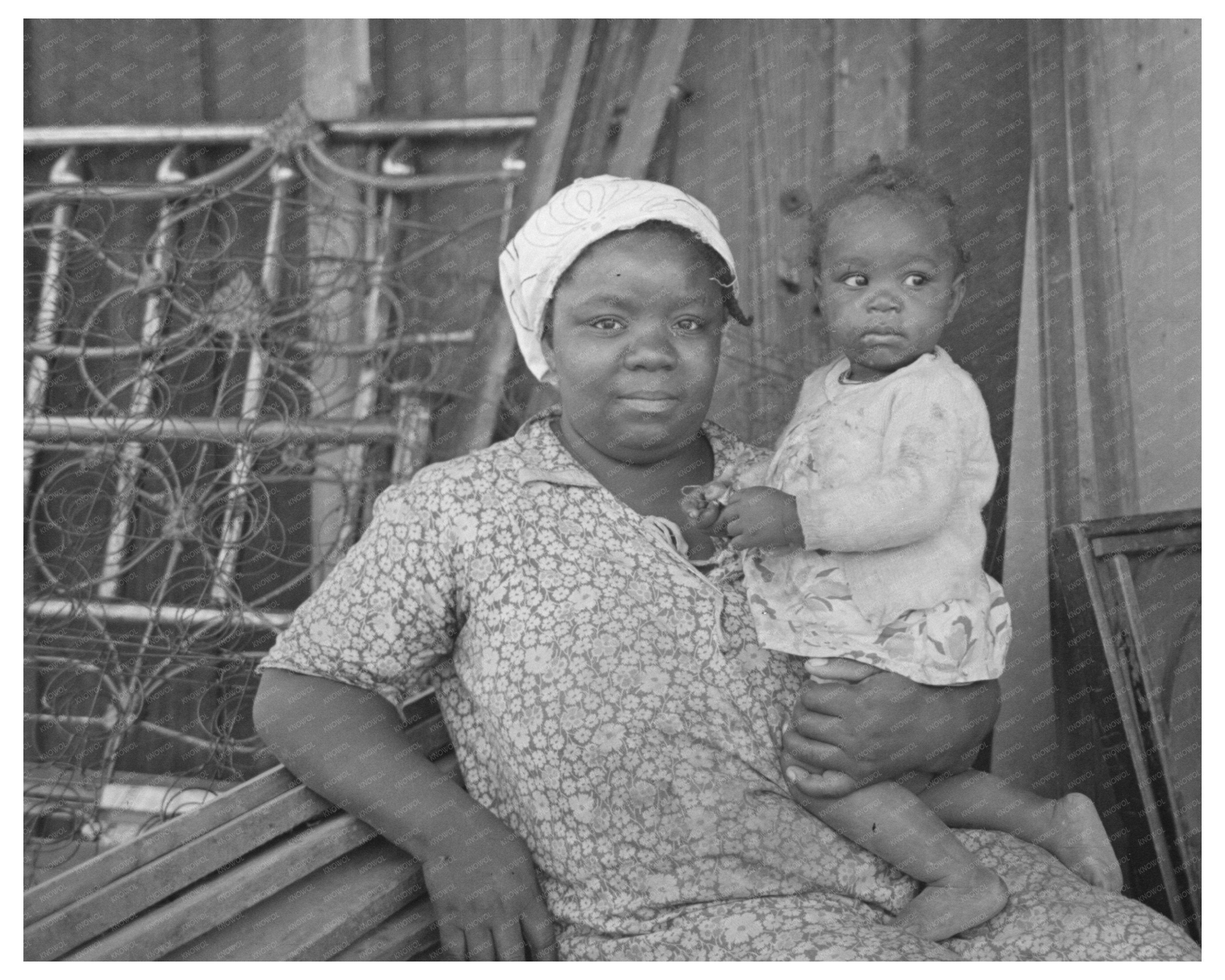 Mother and Child Preparing to Move to Missouri Farms 1938