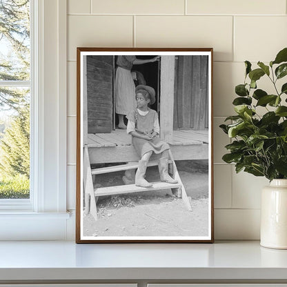 Daughter of Sharecropper on Porch New Madrid County 1938