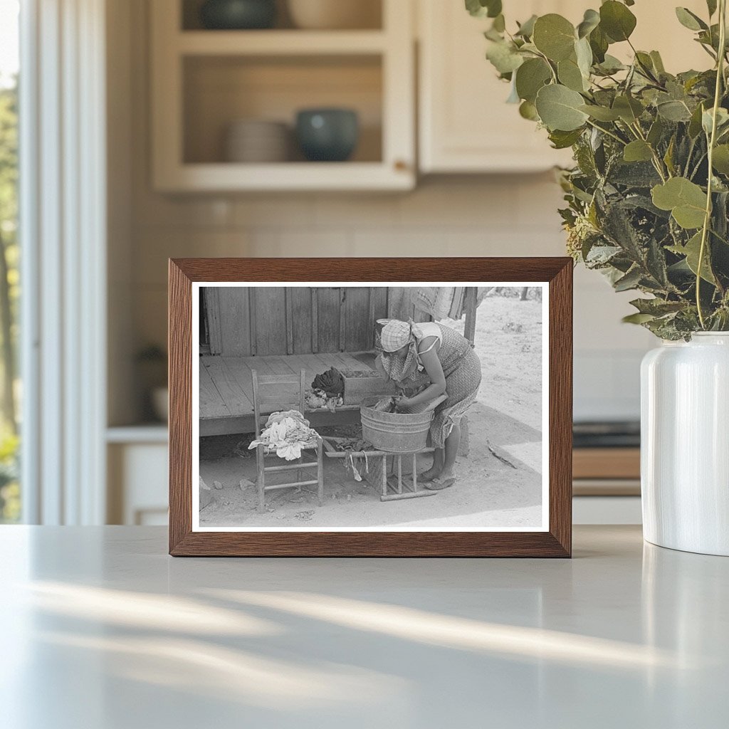 Wife of Farm Security Client Washing Clothes May 1938