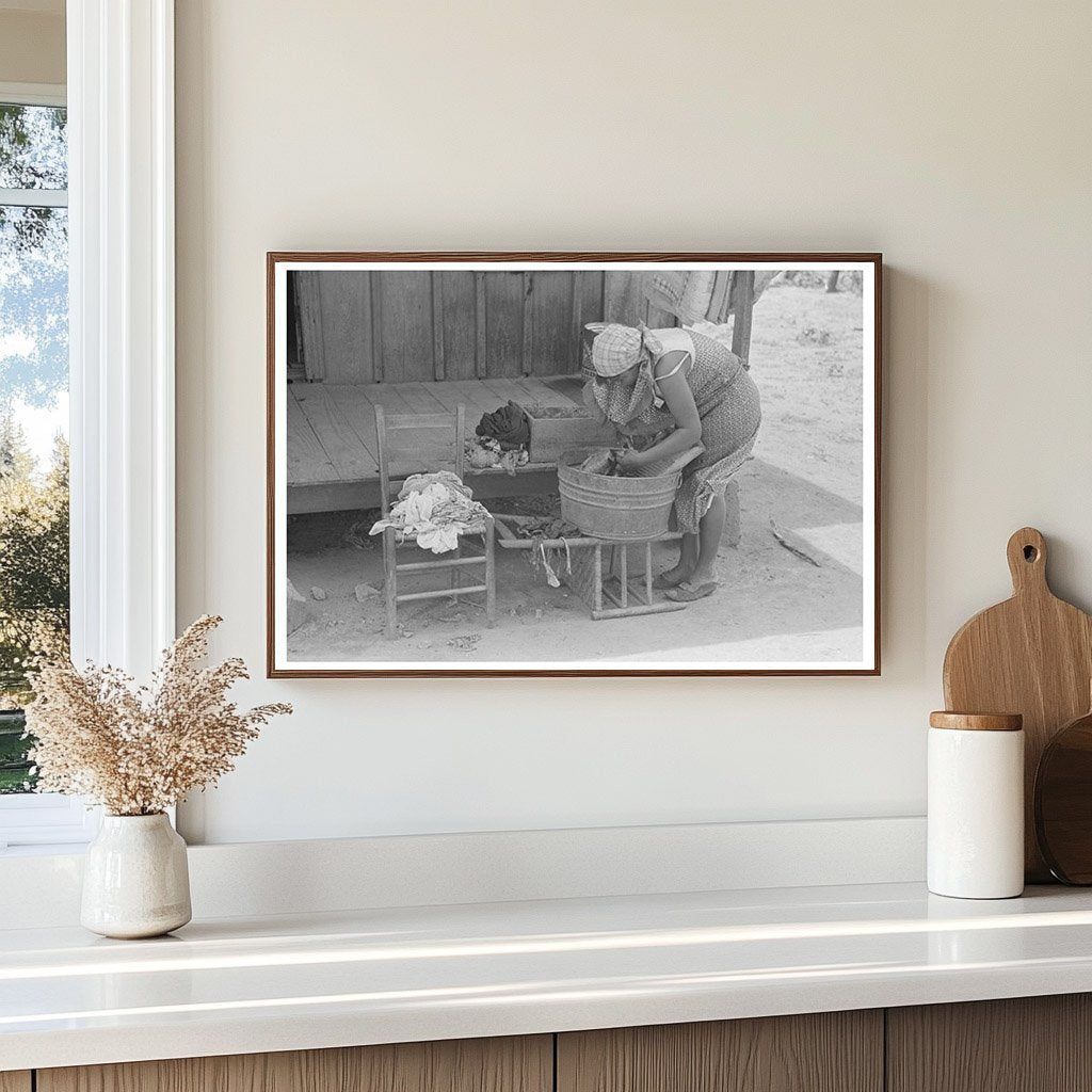 Wife of Farm Security Client Washing Clothes May 1938