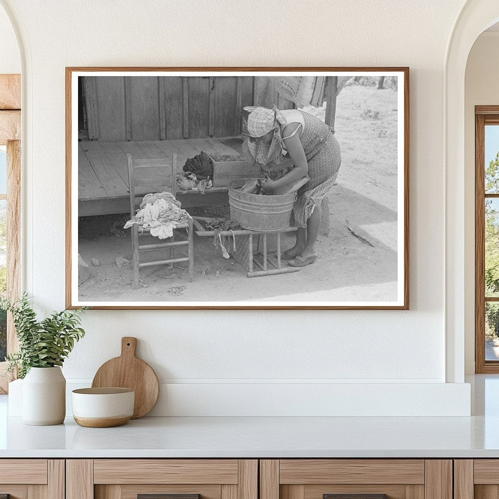 Wife of Farm Security Client Washing Clothes May 1938