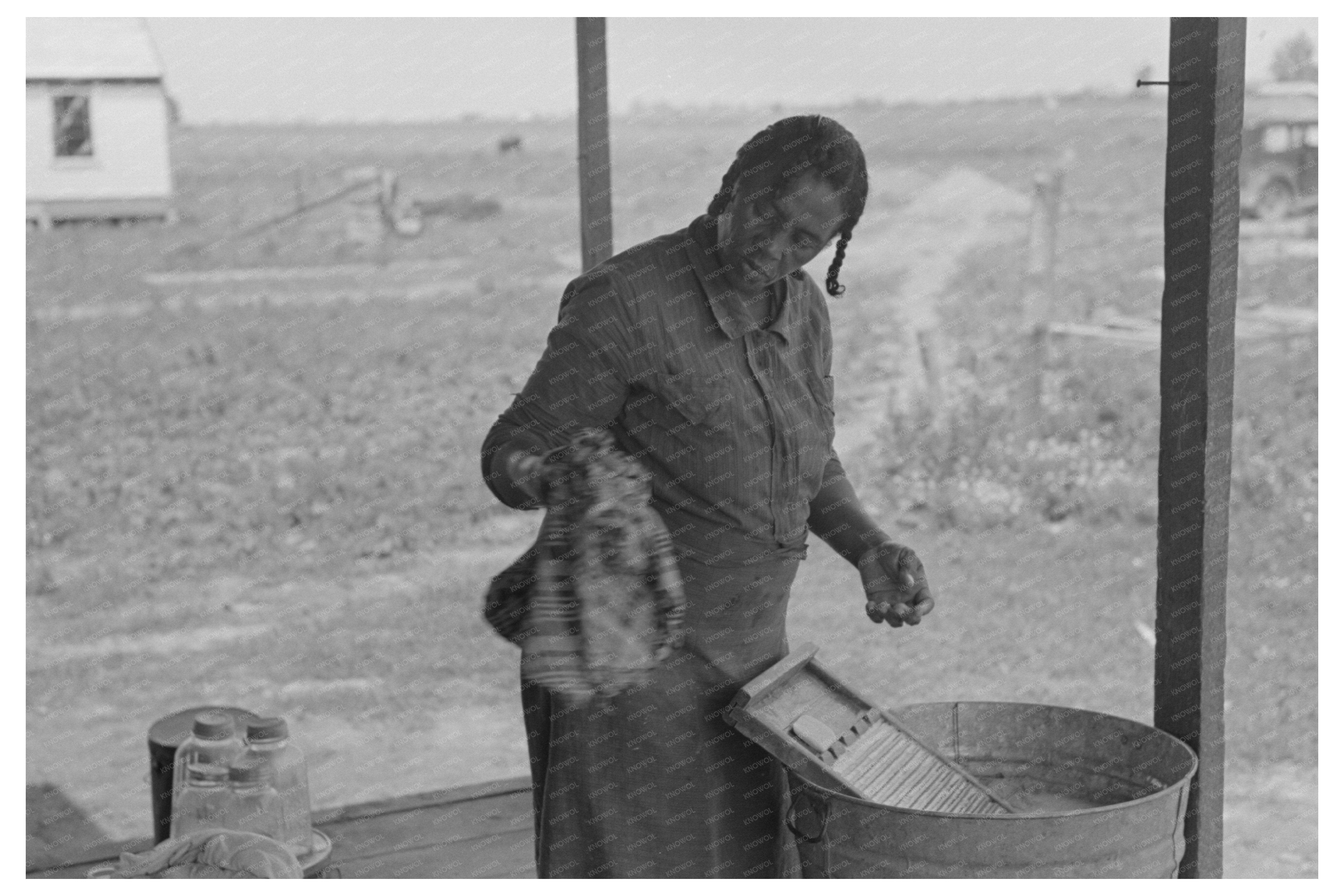 Woman Washing Clothes at Sharecroppers Farm May 1938