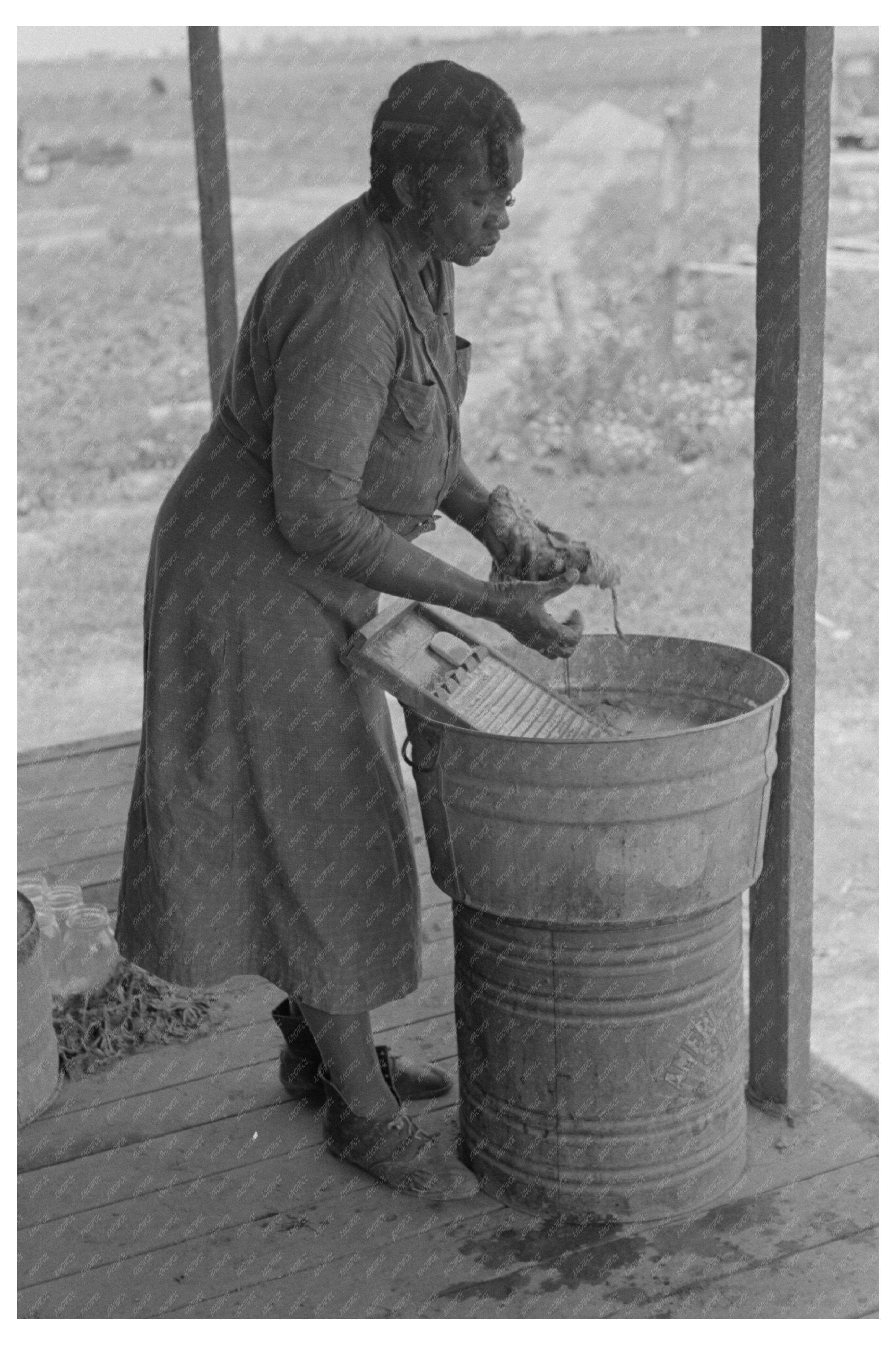 Wife of Sharecropper Washing Clothes May 1938