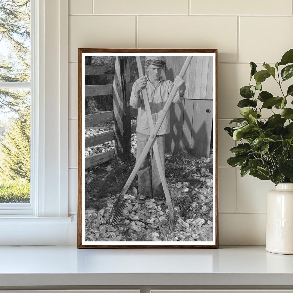 Young Boy with Oyster Rake in Olga Louisiana 1938