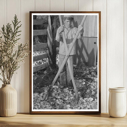 Young Boy with Oyster Rake in Olga Louisiana 1938