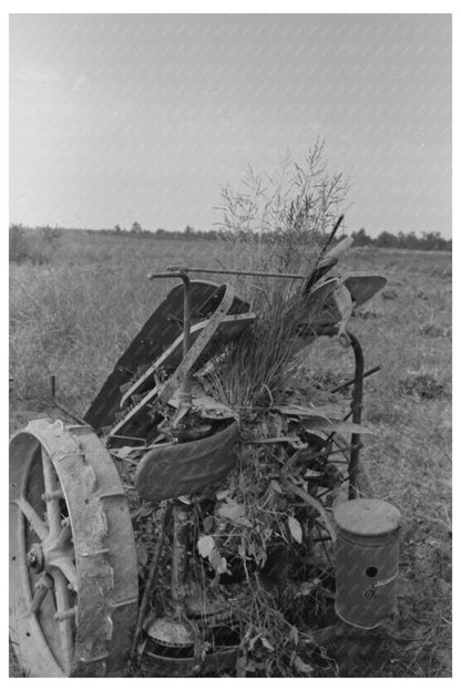 Lake Dick Cooperative Member Repairs Mowing Machine 1938