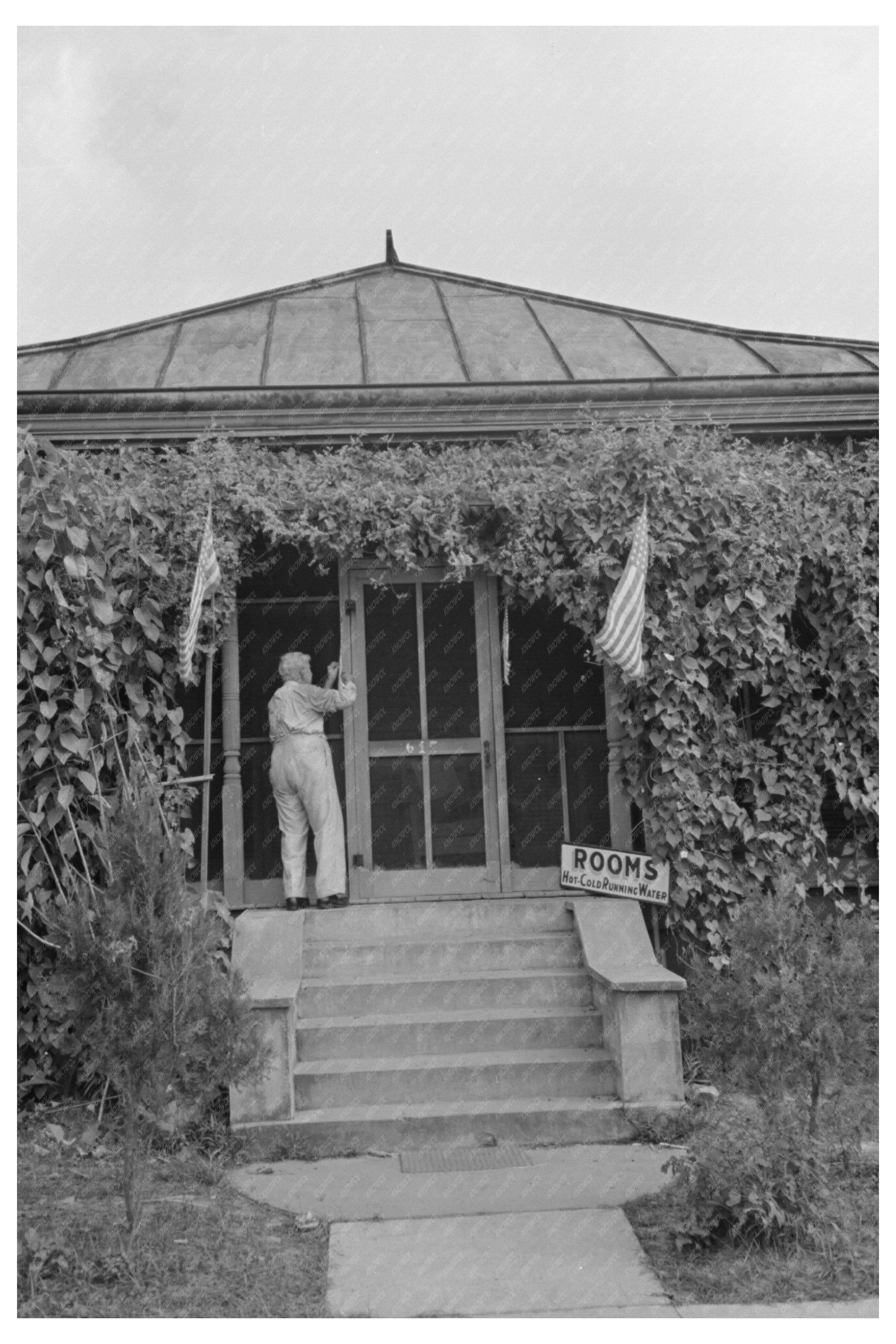 Man Raising Flag at Louisiana State Fair 1938