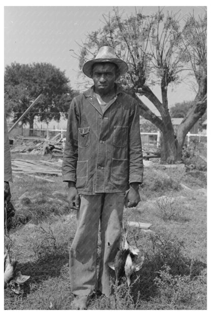 Cajun Laborers with Possum and Birds Crowley Louisiana 1938