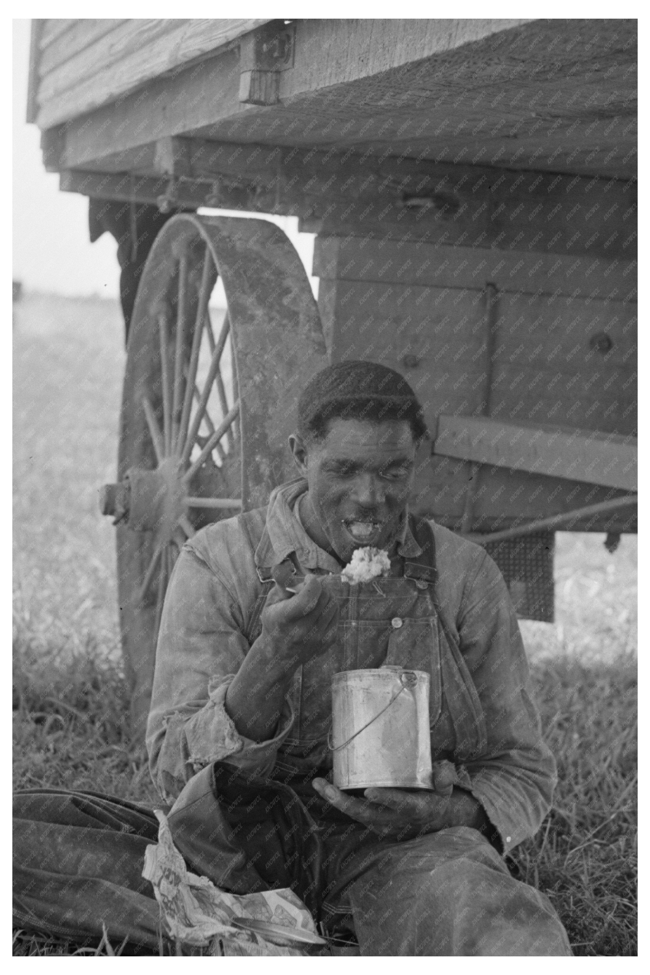 Man Eating Lunch in Sugar Cane Fields October 1938