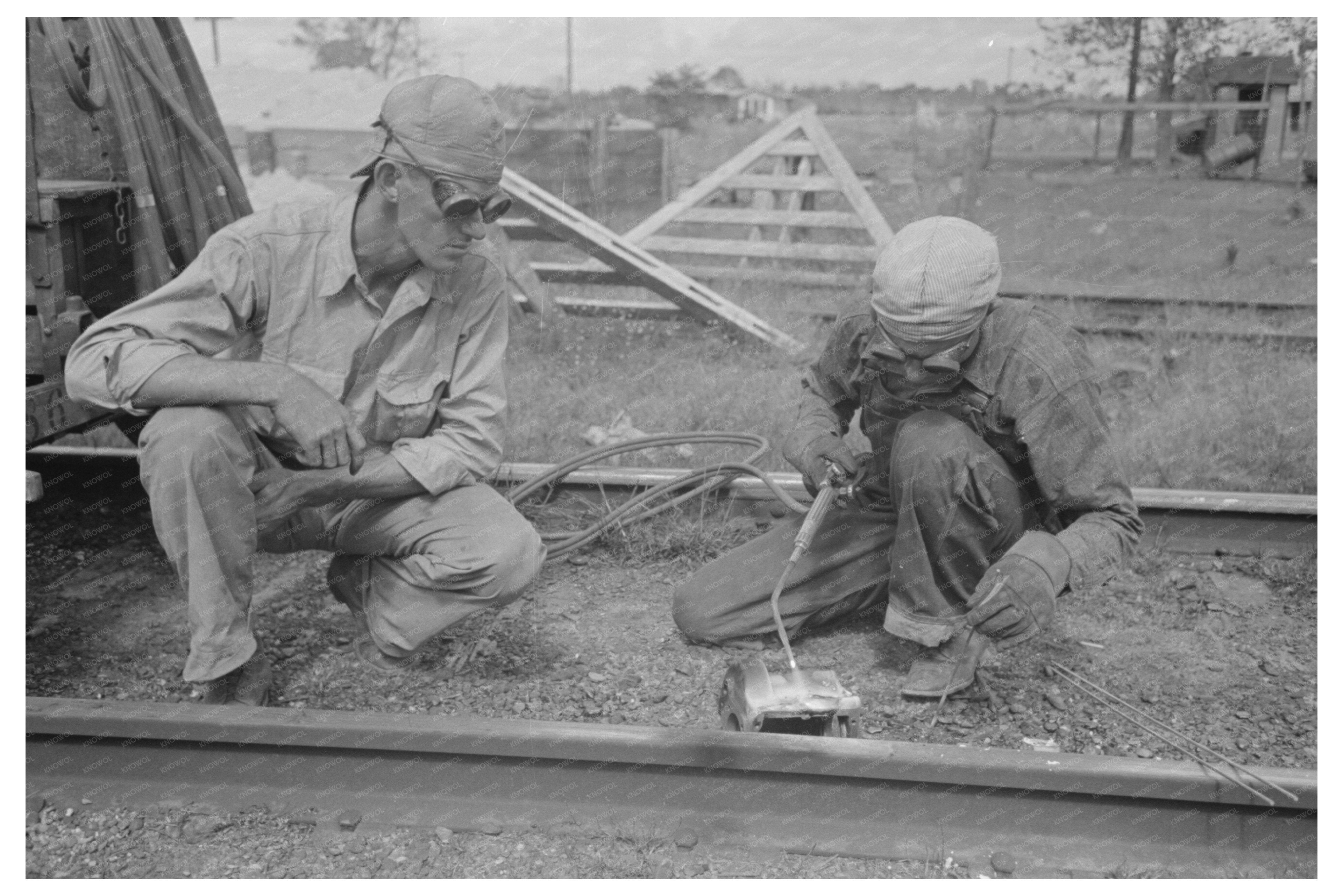 Welding a Rail in Port Barre Louisiana October 1938