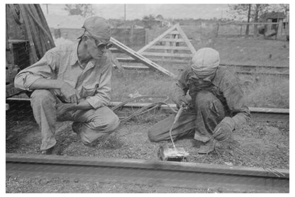 Welding a Rail in Port Barre Louisiana October 1938