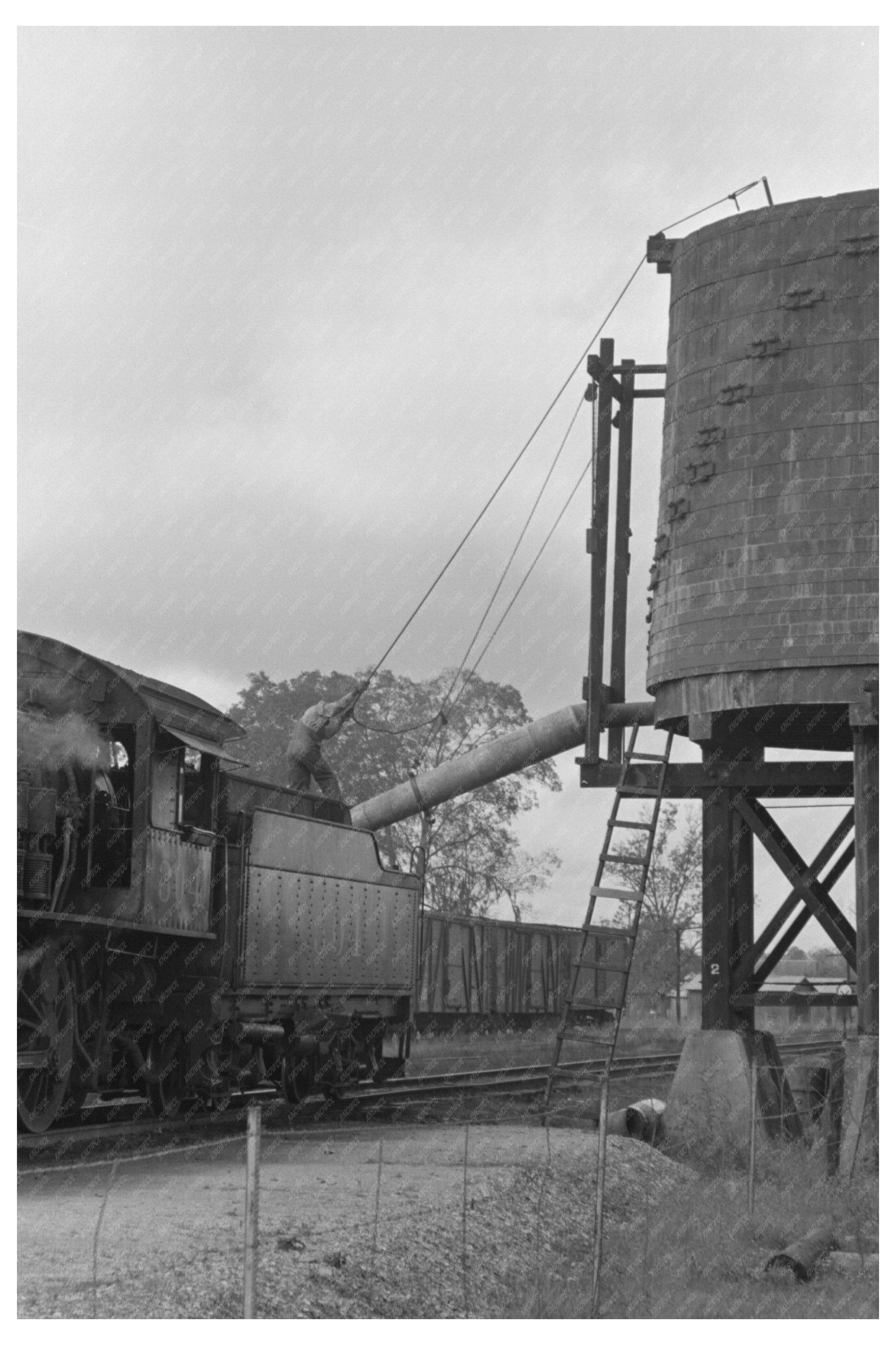 Locomotive Taking on Water Port Barre Louisiana 1938