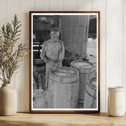 Worker Caulking Barrels at Turpentine Still 1938