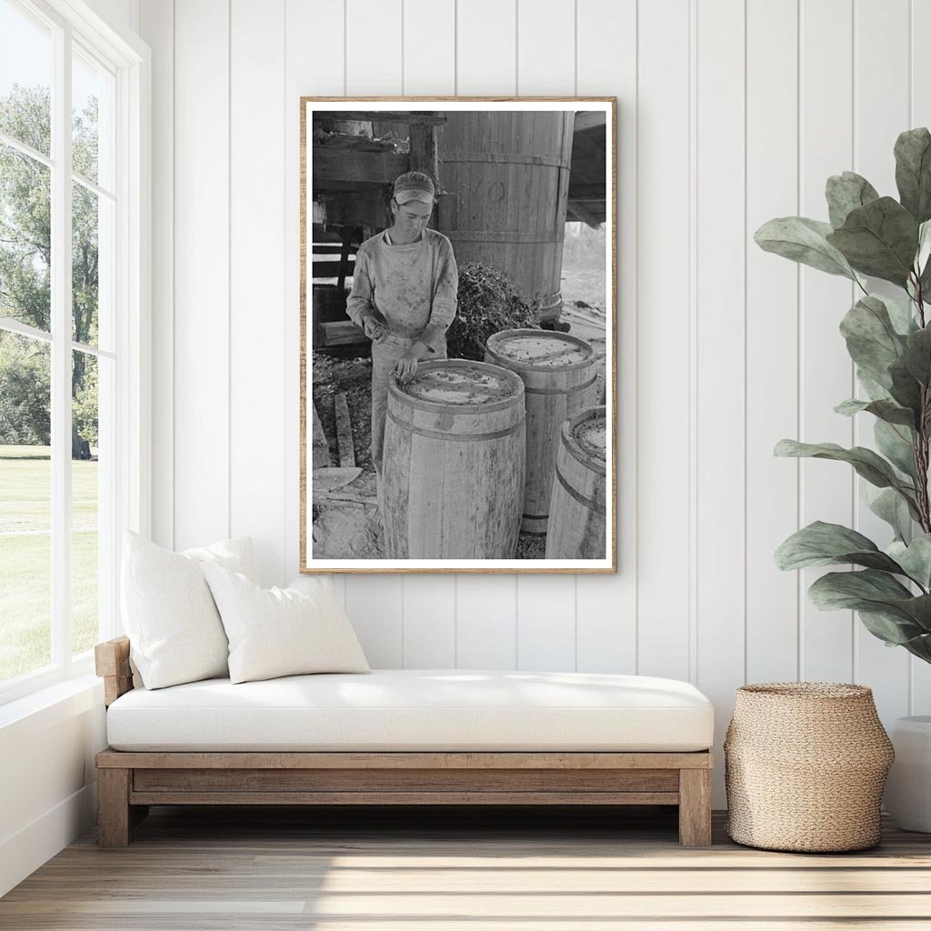 Worker Caulking Barrels at Turpentine Still 1938