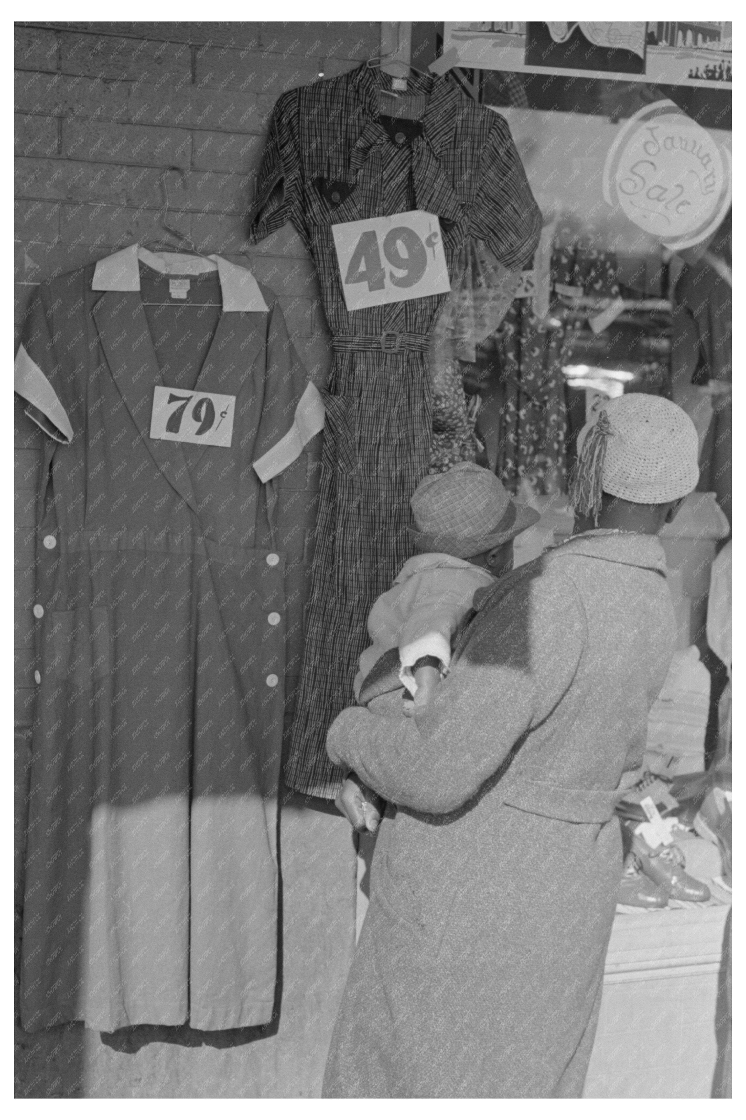 Woman Examines Dresses Outside Shop in Laurel Mississippi 1939