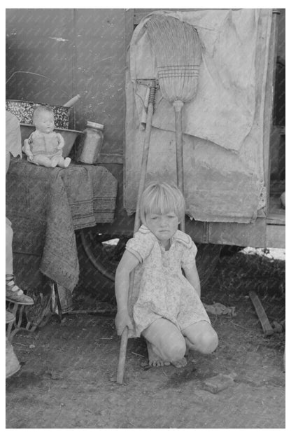 Child in front of trailer home Weslaco Texas 1939