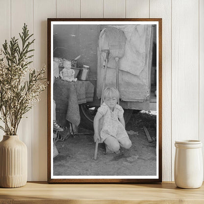 Child in front of trailer home Weslaco Texas 1939