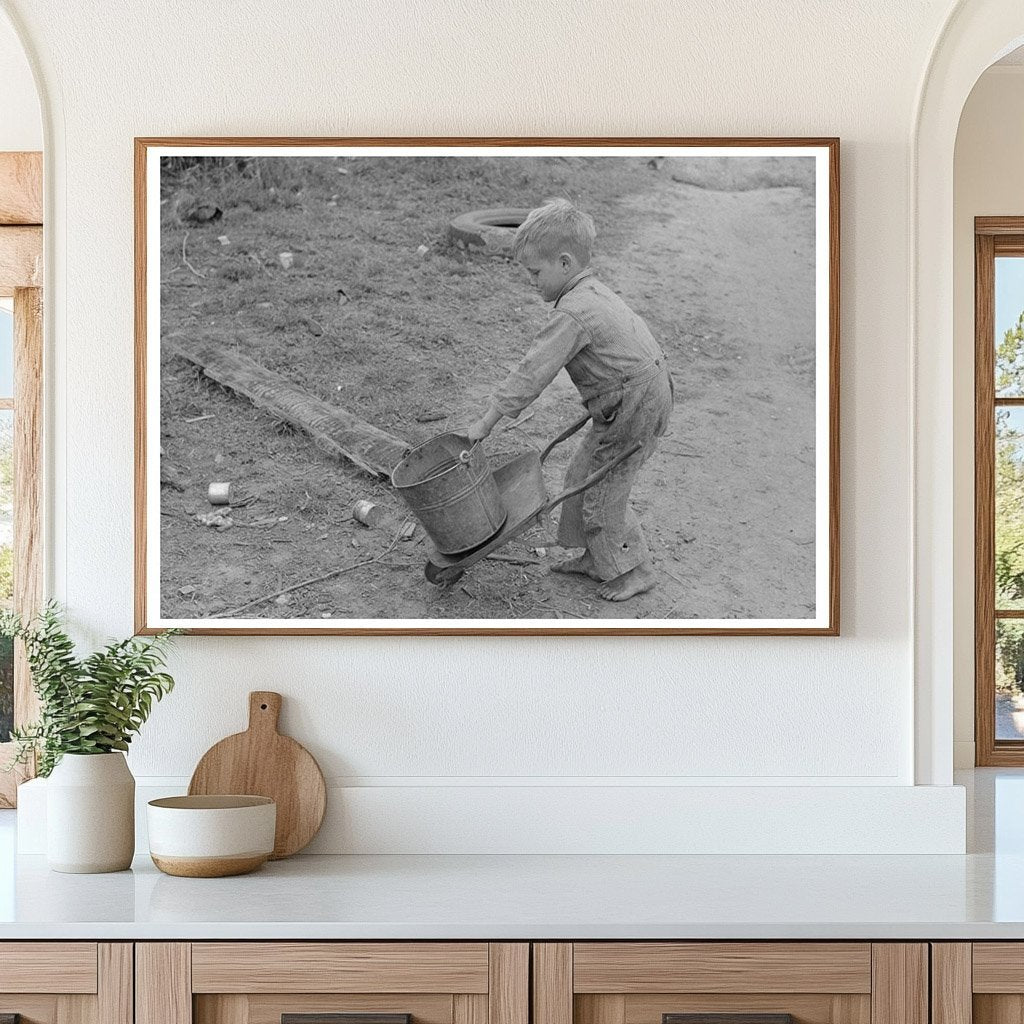 Child of Migrant Worker Playing with Tools 1939