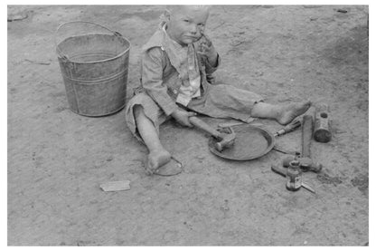 Child Playing with Auto Tools in Harlingen Texas 1939