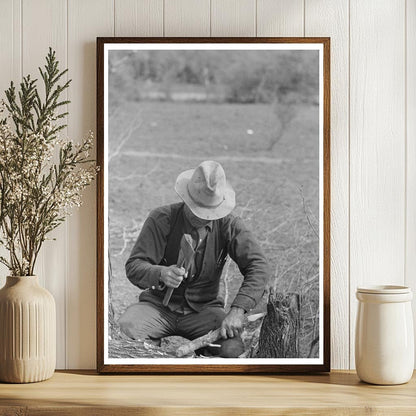 Migrant Worker Building Tent Stakes in Harlingen 1939