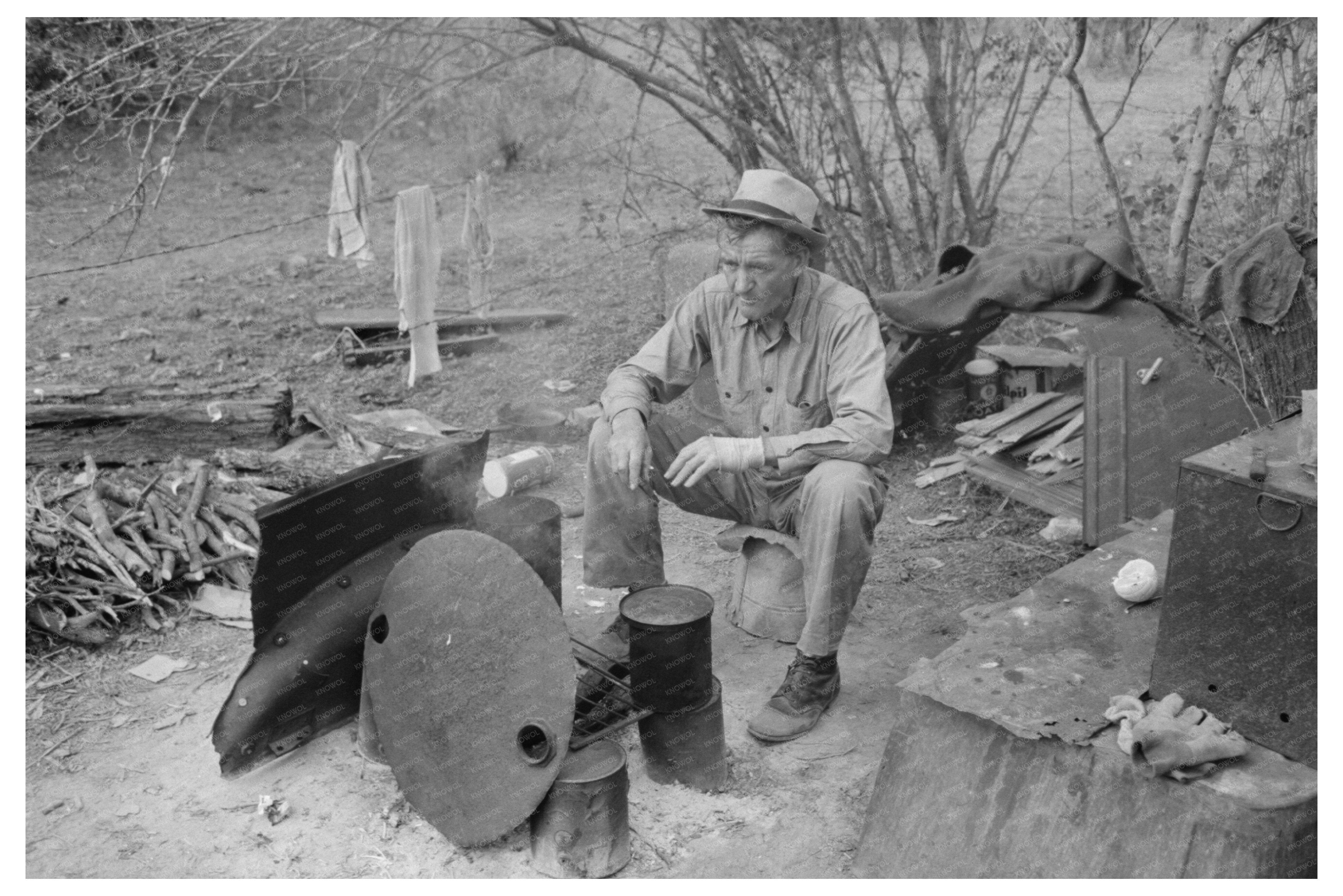 White Migrant Worker by Fire Harlingen Texas February 1939