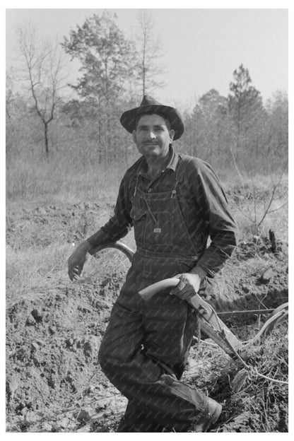 Sharecropper Plowing Field in Mississippi 1938