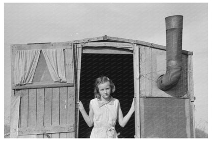 Young Girl in Trailer Doorway Sebastin Texas 1939