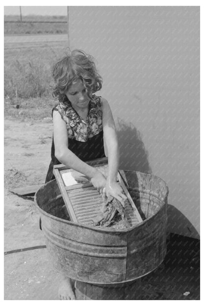 Girl Managing Household in 1939 Texas Migrant Camp