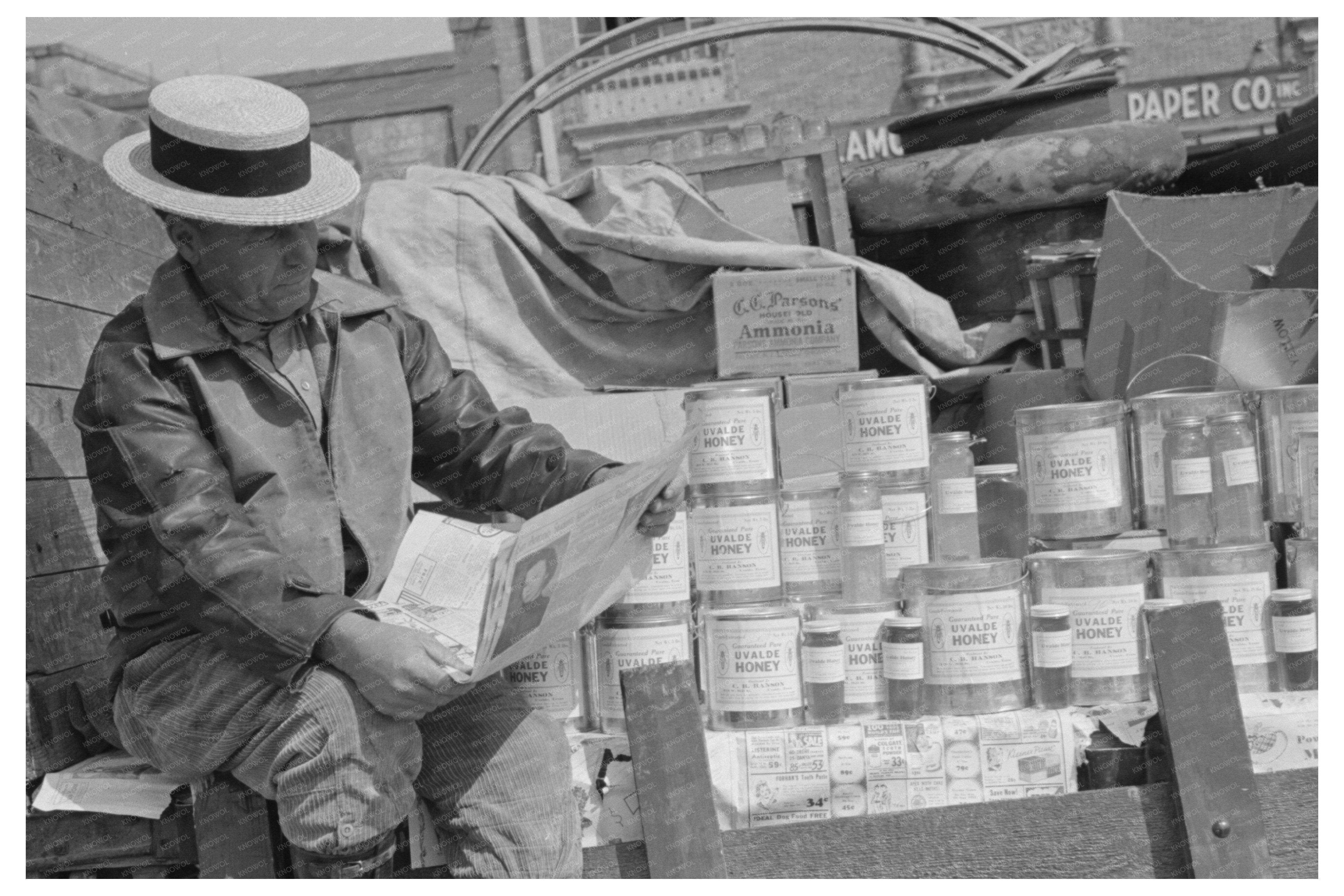 Honey Peddler Reading Newspaper in San Antonio 1939