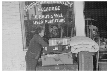 Woman in front of secondhand furniture store San Antonio 1939