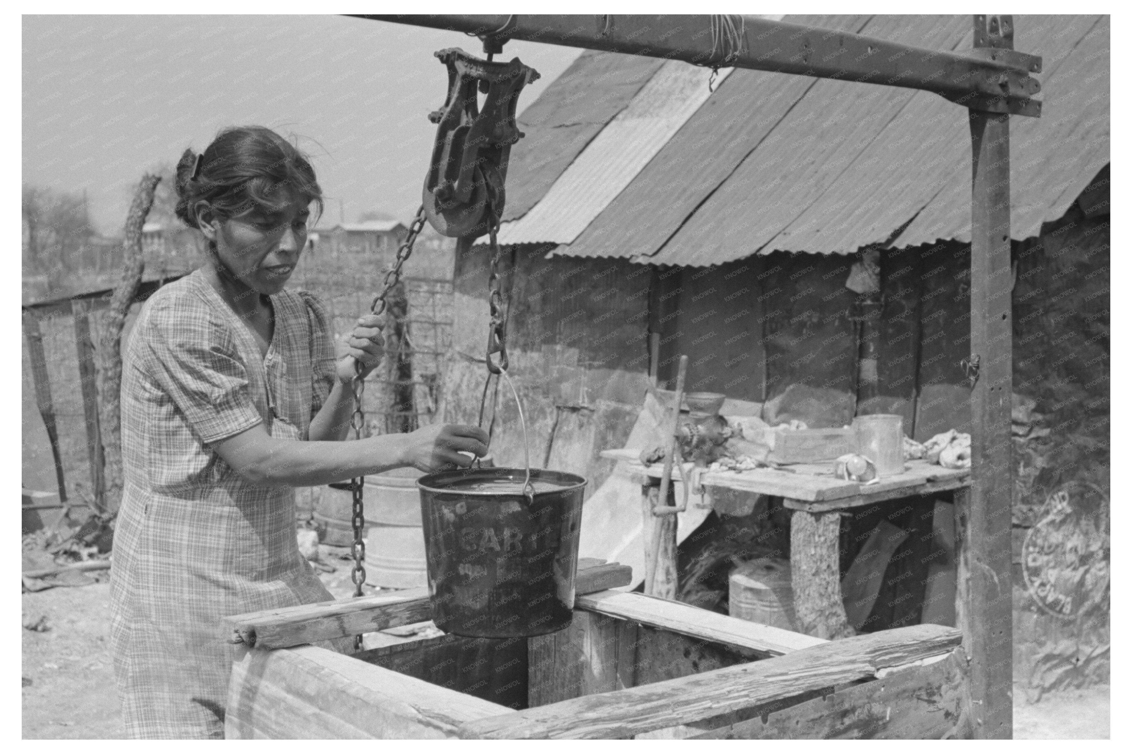 Mexican Woman Drawing Water from Backyard Well 1939