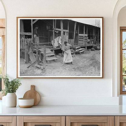 Woman Sweeping Trash in San Antonio Corral 1939