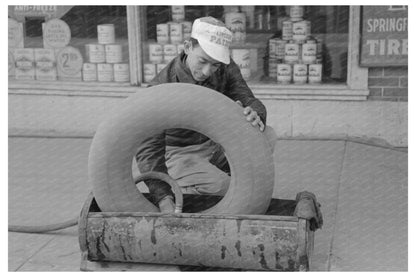 Man Inspects Inner Tube for Leaks Eagle Pass Texas 1939