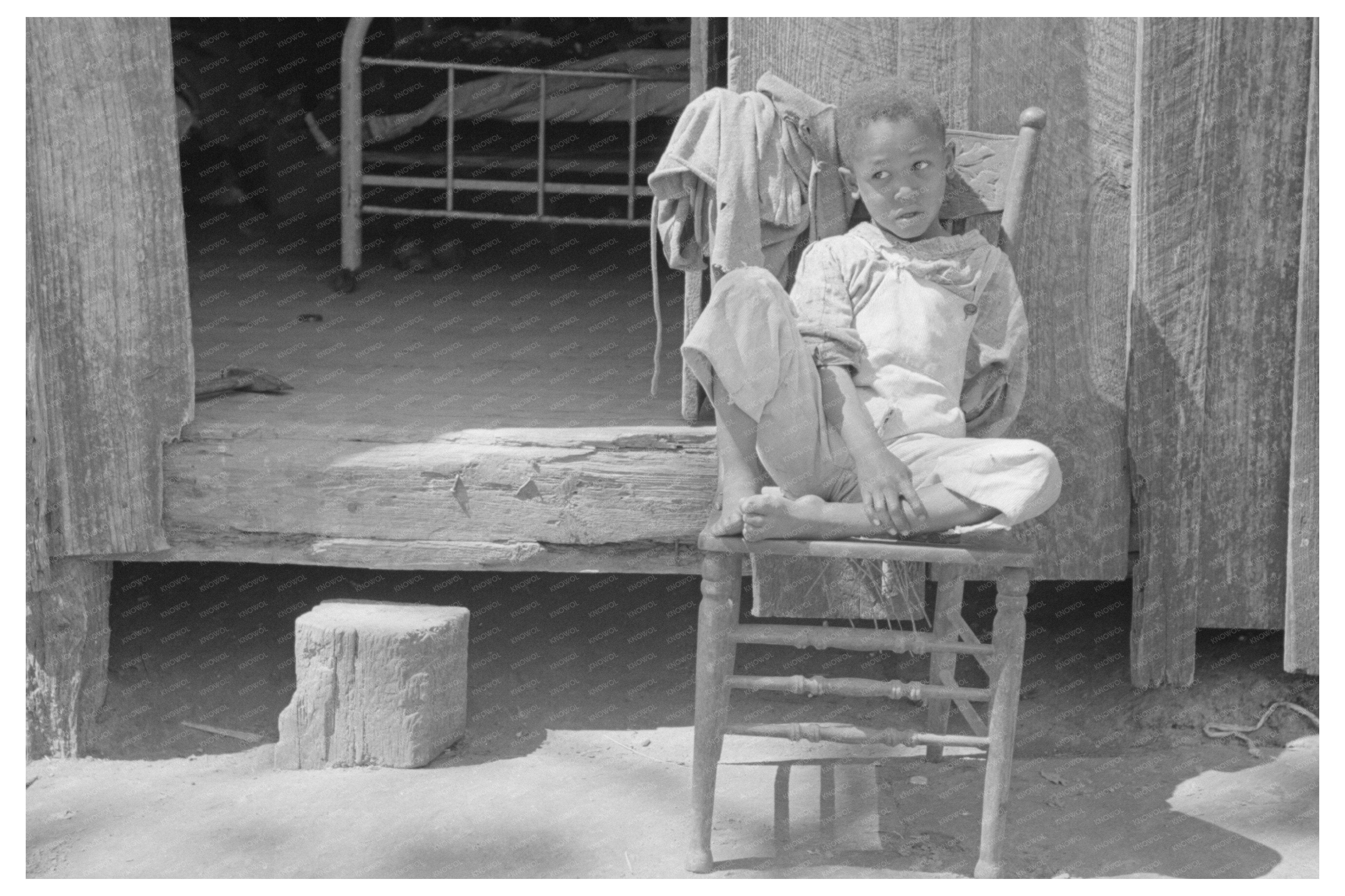 Son of Farmer at Cabin South of Marshall Texas 1939